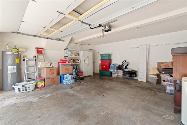 15 Fairwoods Ct, Covington, GA 30016 - garage featuring water heater, white fridge with ice dispenser, and a garage door opener