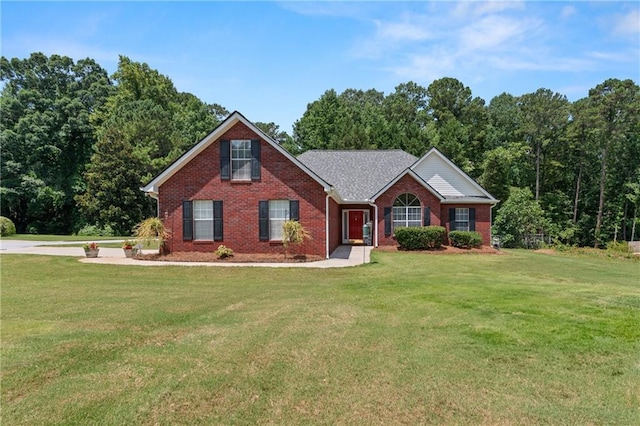 15 Fairwoods Ct, Covington, GA 30016 - view of front of house with brick siding and a front lawn
