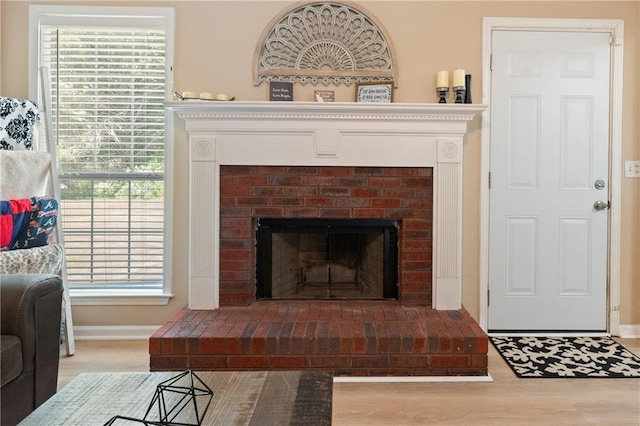 15 Fairwoods Ct, Covington, GA 30016 - living area with a fireplace and wood finished floors