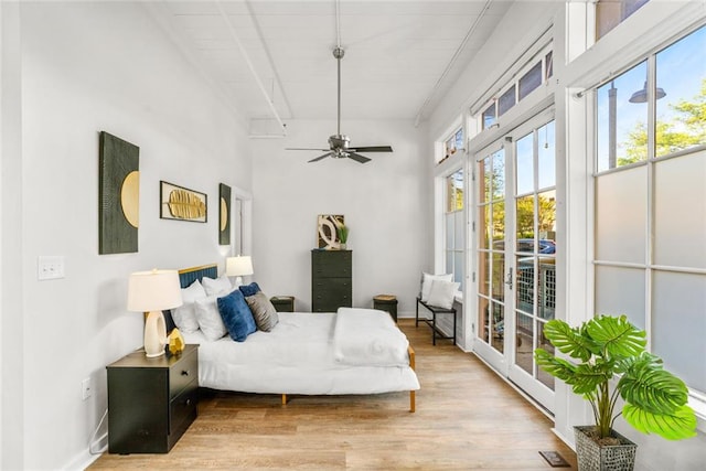 572 Edgewood Ave SE Unit # 106, Atlanta, GA 30312 - bedroom with beam ceiling, visible vents, wood finished floors, access to outside, and ceiling fan