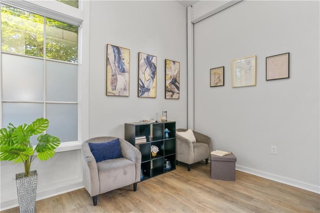 572 Edgewood Ave SE Unit # 106, Atlanta, GA 30312 - sitting room with light wood-type flooring and baseboards
