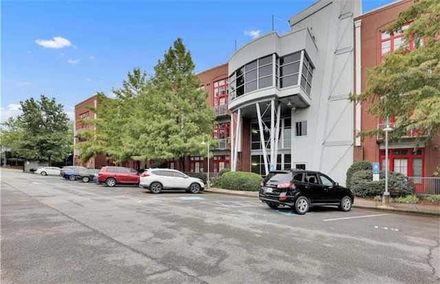 572 Edgewood Ave SE Unit # 106, Atlanta, GA 30312 - view of property with uncovered parking