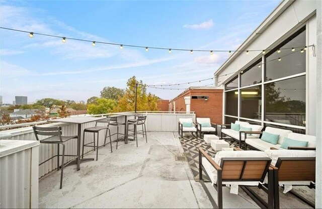 572 Edgewood Ave SE Unit # 106, Atlanta, GA 30312 - view of patio featuring an outdoor hangout area and outdoor dry bar