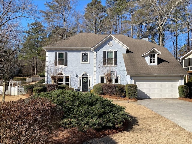 view of front of property with a garage