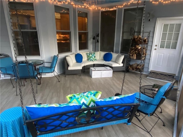 wooden deck featuring a patio and outdoor lounge area