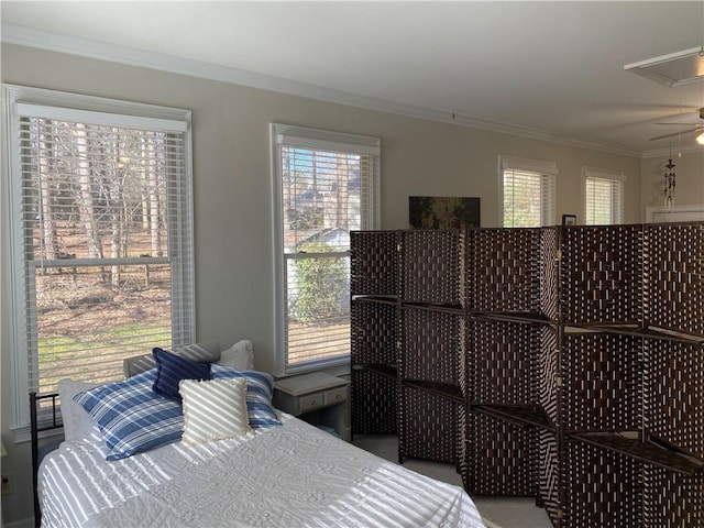 bedroom with crown molding