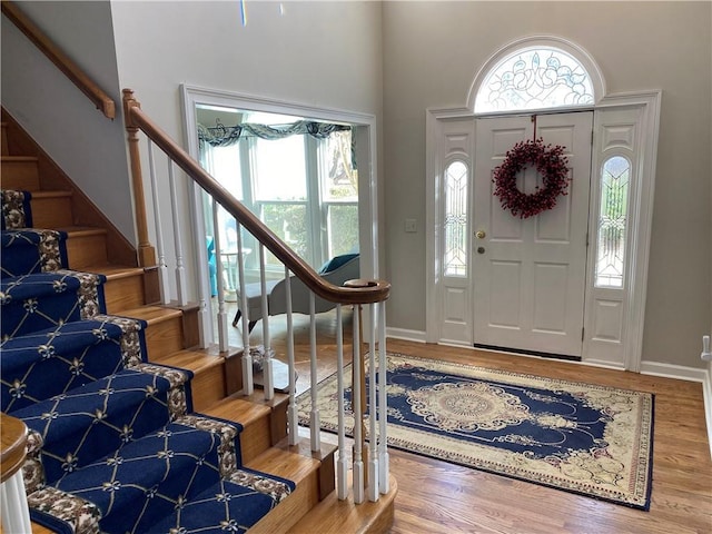 foyer entrance featuring hardwood / wood-style floors