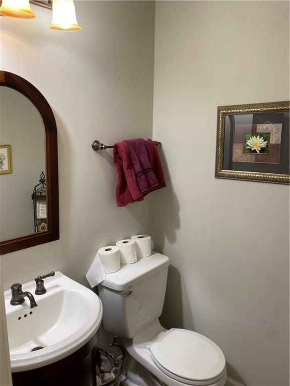 bathroom with sink and toilet