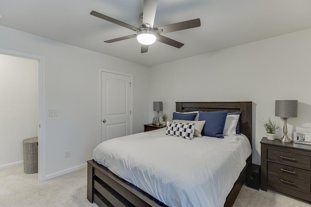 bedroom with light colored carpet and ceiling fan