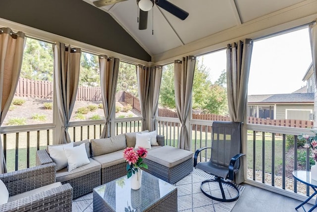 sunroom / solarium featuring ceiling fan and lofted ceiling