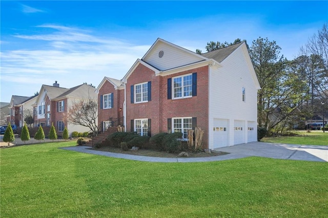 view of front of property with a front lawn, brick siding, driveway, and an attached garage