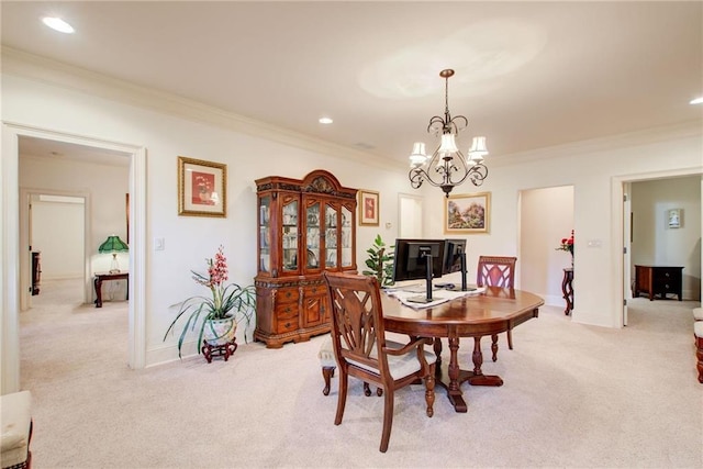 dining space featuring a notable chandelier, crown molding, and light carpet