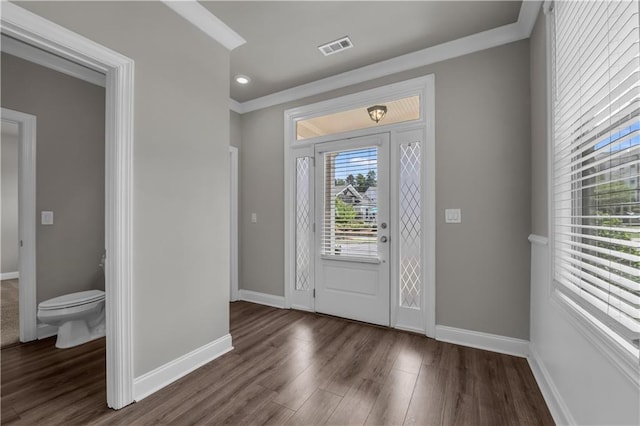1179 Bennett Creek Overlook, Suwanee, GA 30024 - entrance foyer featuring wood finished floors, baseboards, and crown molding
