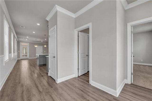 1179 Bennett Creek Overlook, Suwanee, GA 30024 - corridor with crown molding, wood finished floors, recessed lighting, and baseboards