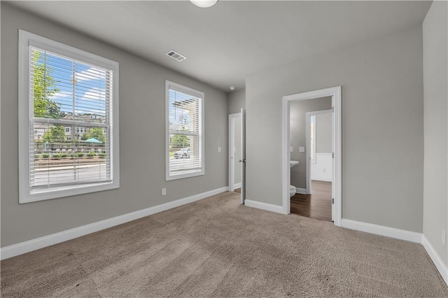 1179 Bennett Creek Overlook, Suwanee, GA 30024 - unfurnished bedroom with carpet and baseboards