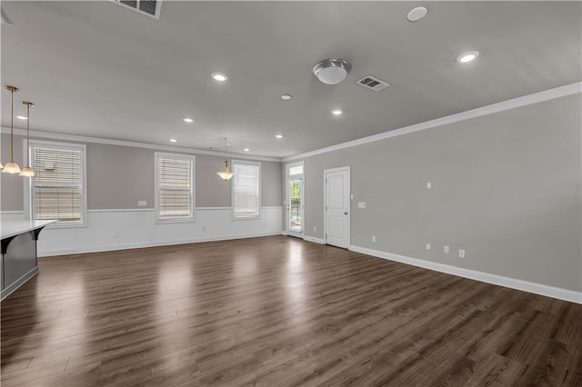 1179 Bennett Creek Overlook, Suwanee, GA 30024 - unfurnished living room with crown molding, dark wood-type flooring, recessed lighting, and baseboards