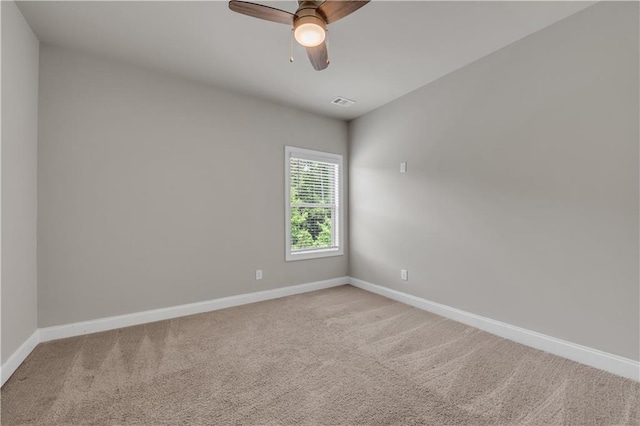 1179 Bennett Creek Overlook, Suwanee, GA 30024 - spare room featuring light carpet, baseboards, and a ceiling fan