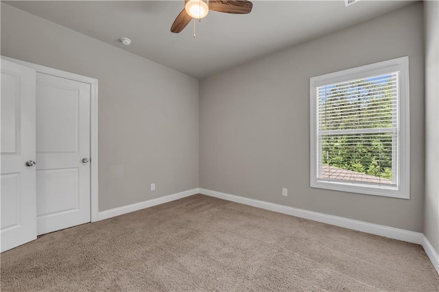 1179 Bennett Creek Overlook, Suwanee, GA 30024 - spare room featuring carpet, baseboards, a ceiling fan, and a smoke detector