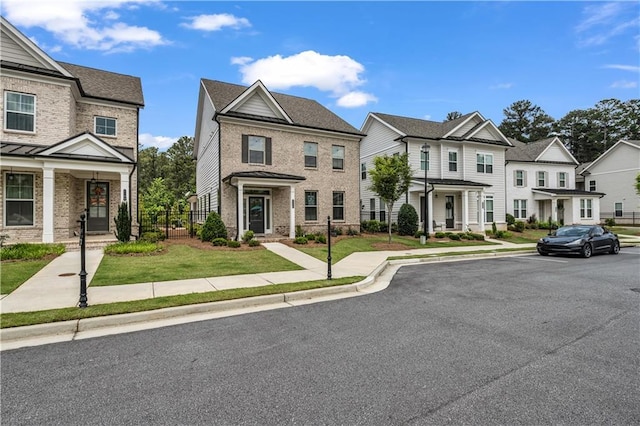 1179 Bennett Creek Overlook, Suwanee, GA 30024 - view of property with a residential view and brick siding
