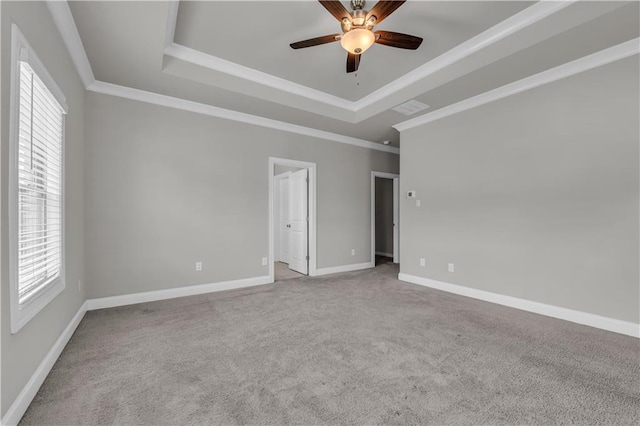 1179 Bennett Creek Overlook, Suwanee, GA 30024 - carpeted empty room with a raised ceiling, plenty of natural light, a ceiling fan, ornamental molding, and baseboards
