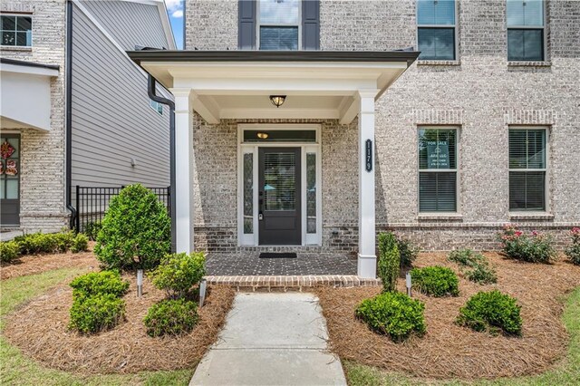 1179 Bennett Creek Overlook, Suwanee, GA 30024 - view of exterior entry with brick siding