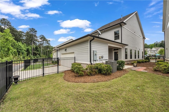 1179 Bennett Creek Overlook, Suwanee, GA 30024 - view of home's exterior featuring central AC unit and an attached garage