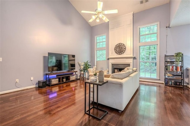 2022 Maple Ridge Dr NW, Acworth, GA 30101 - living area with plenty of natural light, high vaulted ceiling, ceiling fan, dark wood-style flooring, and a fireplace