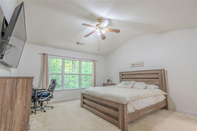 2022 Maple Ridge Dr NW, Acworth, GA 30101 - carpeted bedroom with vaulted ceiling, an office area, a textured ceiling, baseboards, and a ceiling fan