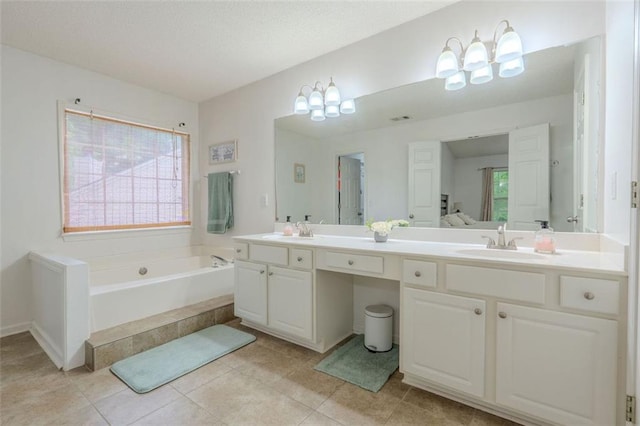 2022 Maple Ridge Dr NW, Acworth, GA 30101 - ensuite bathroom with a chandelier, double vanity, a bath, and tile patterned flooring