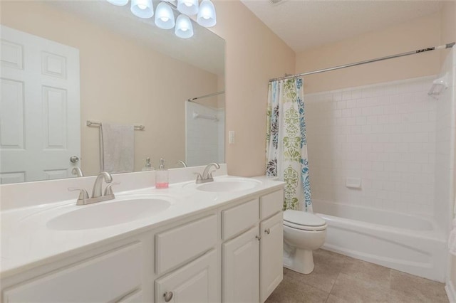 2022 Maple Ridge Dr NW, Acworth, GA 30101 - full bath featuring toilet, tile patterned flooring, shower / bath combo with shower curtain, double vanity, and a chandelier
