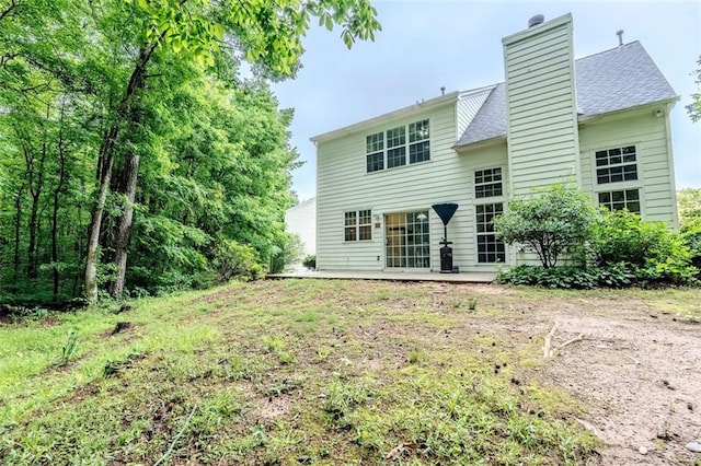 2022 Maple Ridge Dr NW, Acworth, GA 30101 - back of property with a chimney, a patio, and a shingled roof