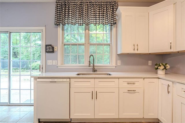 2022 Maple Ridge Dr NW, Acworth, GA 30101 - kitchen with dishwasher, a sink, white cabinets, and light countertops