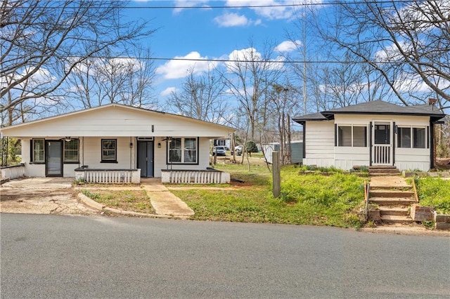 view of front of house with covered porch