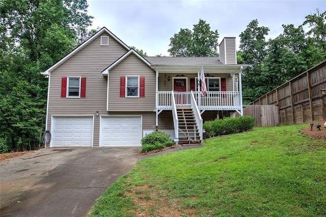 80 Broadlands Dr, White, GA 30184 - view of front facade with a chimney, an attached garage, stairway, driveway, and a porch