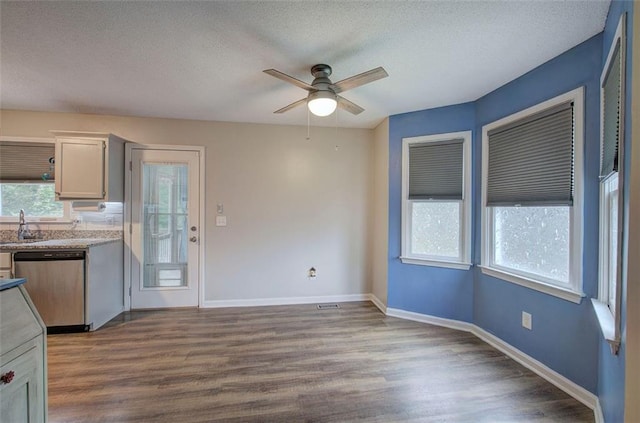 80 Broadlands Dr, White, GA 30184 - kitchen with dishwasher, ceiling fan, dark wood-type flooring, a textured ceiling, and light countertops