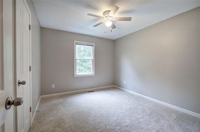 80 Broadlands Dr, White, GA 30184 - empty room featuring carpet, a ceiling fan, and a textured ceiling