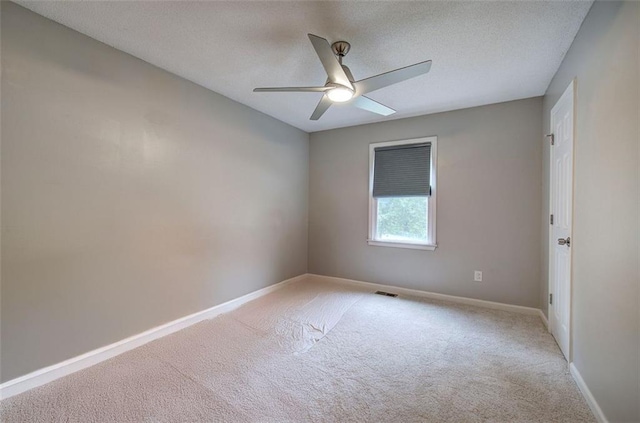80 Broadlands Dr, White, GA 30184 - empty room with light colored carpet, a ceiling fan, and a textured ceiling