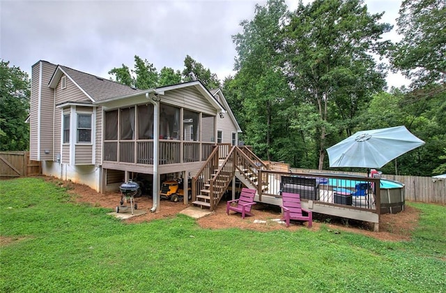 80 Broadlands Dr, White, GA 30184 - back of house with a sunroom, a fenced backyard, stairs, a deck, and roof with shingles