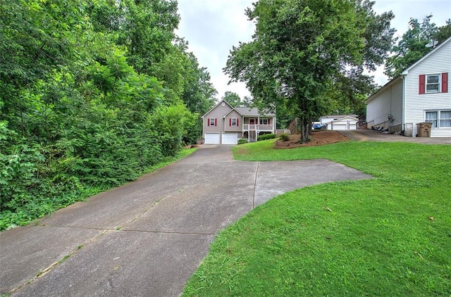 80 Broadlands Dr, White, GA 30184 - view of front facade with a front yard, driveway, and an attached garage