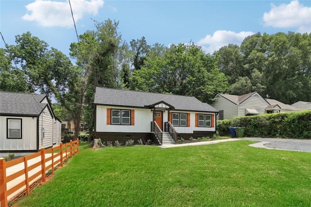 view of front of home with a front yard