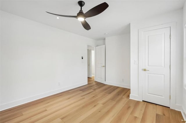 unfurnished bedroom with light wood-type flooring and ceiling fan