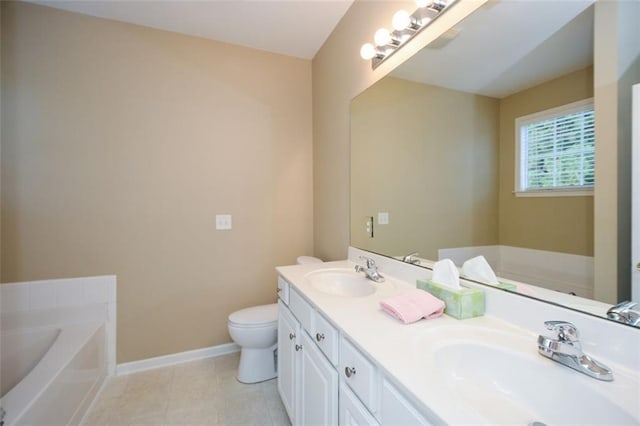 bathroom with vanity, toilet, a bathing tub, and tile patterned flooring