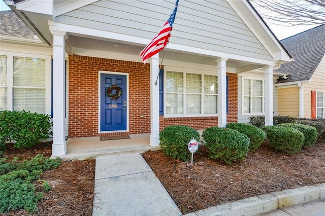 entrance to property with a porch