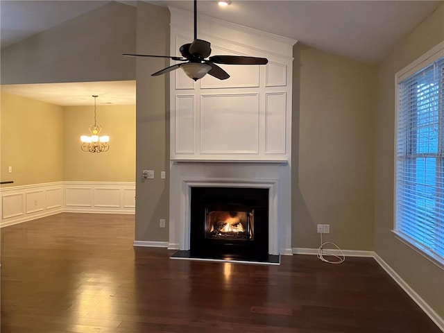 details with ceiling fan with notable chandelier and hardwood / wood-style floors