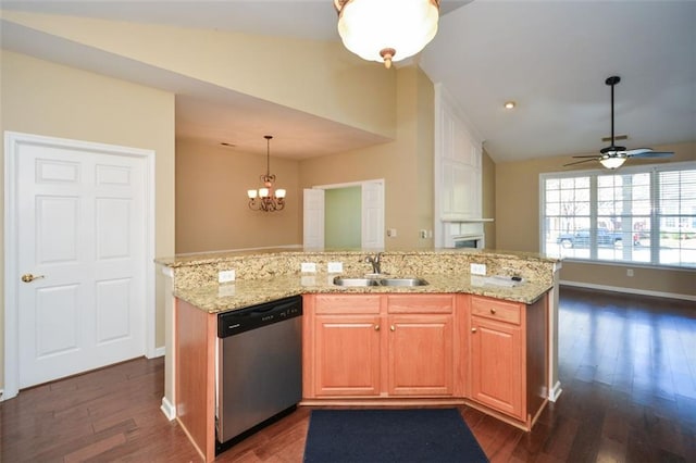 kitchen with stainless steel dishwasher, lofted ceiling, an island with sink, and sink