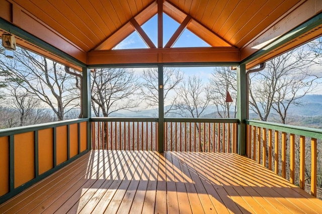 wooden deck featuring a gazebo