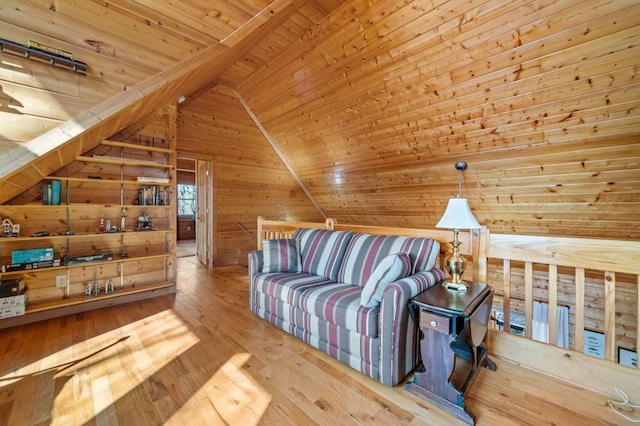 living area featuring wooden walls, wood ceiling, vaulted ceiling, and hardwood / wood-style flooring