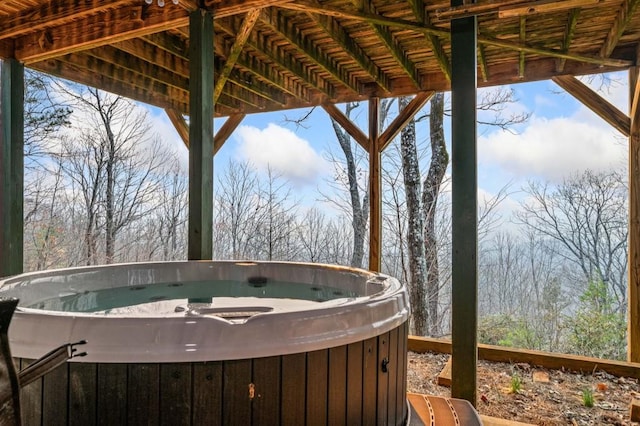 exterior space featuring a hot tub