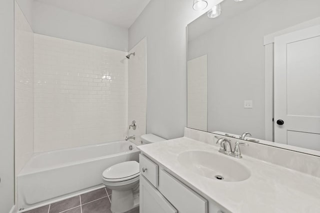 bathroom with toilet, tile patterned flooring, shower / washtub combination, and vanity