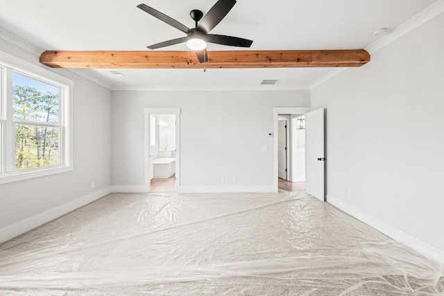 unfurnished bedroom featuring beamed ceiling, visible vents, and baseboards